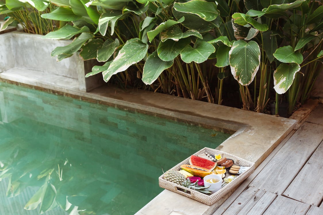 Served Tray with Fruit Plate by Hotel Pool on Bali Villa